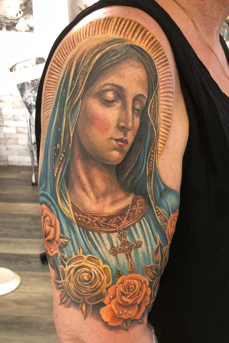 Virgin Mary tattoo