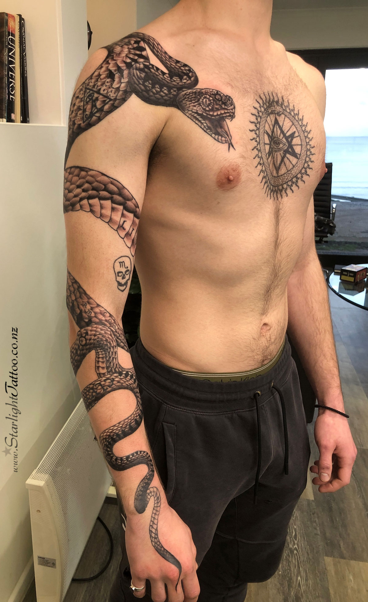 Snake sleeve tattoo