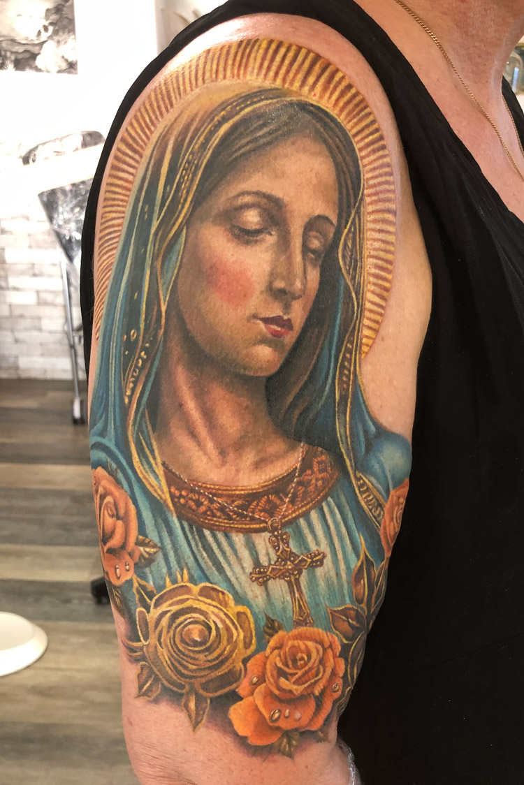 Virgin Mary tattoo